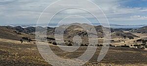 Along the road from San Pedro de Tiquina to Copacabana on the Titicaca lake, the largest highaltitude lake in the world 3808m photo